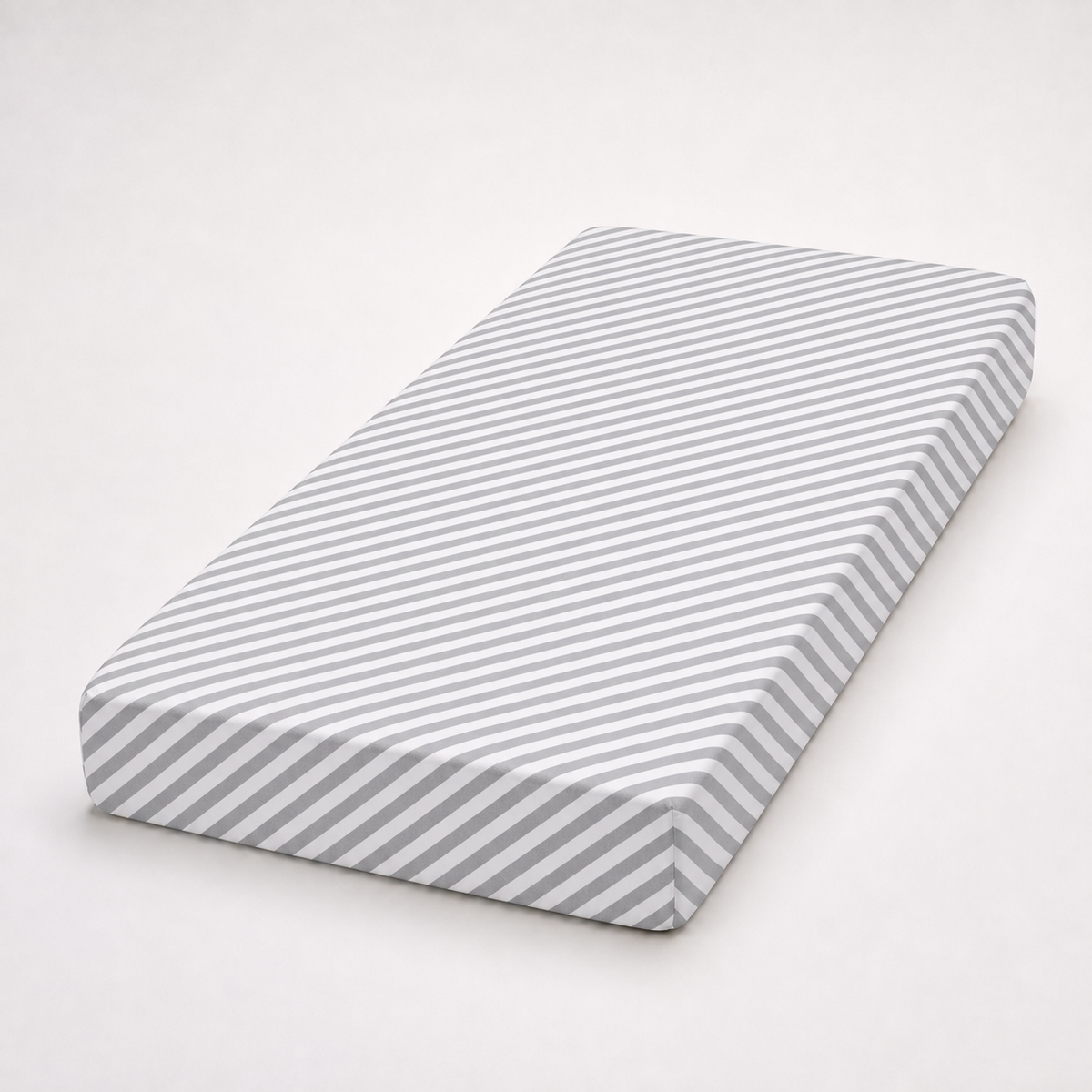 A rectangular fitted sheet with a diagonal gray and white stripe pattern, shown on a solid light gray background.
