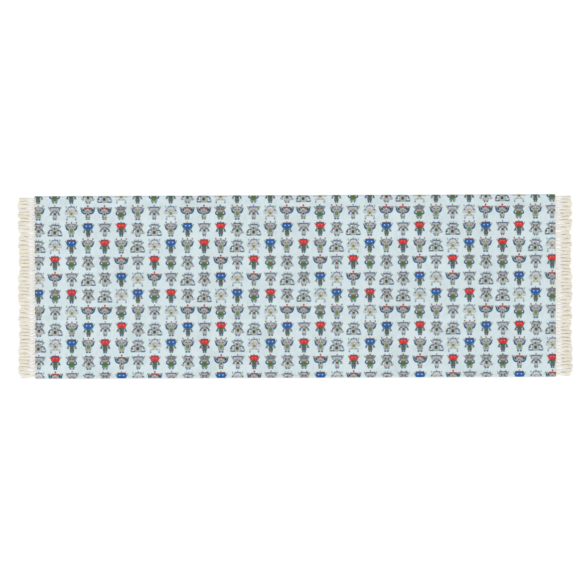 A rectangular woven runner with fringe on both ends, featuring a repeating pattern of cartoon teddy bears in blue, red, and gray on a white background.
